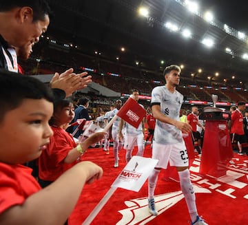 BANGKOK, THAILAND - JULY 12: (THE SUN OUT,THE SUN ON SUNDAY OUT ) Luis Diaz of Liverpool leads the way on to the pitch before the preseason friendly match between Liverpool and Manchester United at Rajamangala Stadium on July 12, 2022 in Bangkok, Thailand. (Photo by Andrew Powell/Liverpool FC via Getty Images)