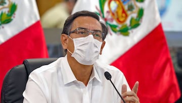 Handout picture released by the Peruvian Presidency showing Peru&#039;s President Martin Vizcarra wearing a face mask as he speaks during a televised press conference in Lima on May 5, 2020 as the country continues in state of national emergency due to the novel coronavirus, COVID-19, pandemic. - Vizcarra ruled out that schools and universities could restart face-to-face classes this year due to the magnitude of the pandemic. He also warned of very serious economic consequences for the country, similar to those linked to the War of the Pacific (1879-1884) which had a major impact on the population and the Peruvian economy. Peru has reported over 51,100 COVID-19 infections and a death toll close to 1,500. (Photo by - / Peruvian Presidency / AFP) / RESTRICTED TO EDITORIAL USE - MANDATORY CREDIT &quot;AFP PHOTO / PERU&#039;S PRESIDENCY&quot; - NO MARKETING - NO ADVERTISING CAMPAIGNS - DISTRIBUTED AS A SERVICE TO CLIENTS