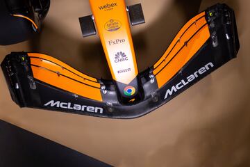 Detalles del nuevo monoplaza de McLaren Formula 1 Team. El naranja papaya sigue siendo su gran seña de identidad, aunque el negro fibra de carbono gana fuerza.