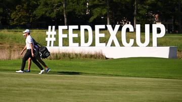 MEMPHIS, TENNESSEE - AUGUST 12: Patrick Cantlay walks past the #FEDEXCUP signage at the 13th hole during the second round of the FedEx St. Jude Championship at TPC Southwind on August 12, 2022 in Memphis, Tennessee. (Photo by Tracy Wilcox/PGA TOUR via Getty Images)