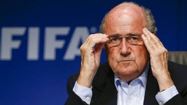 Blatter to attend World Cup as guest of Putin despite ban