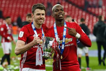 Manchester United's French midfielder Paul Pogba and Manchester United's English midfielder Michael Carrick
