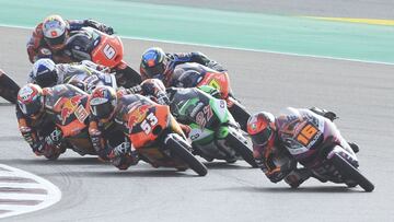 Italian rider Andrea Migno of the Rivacold Snipers Team leads during Moto GP 3 at the Losail International Circuit in Doha, Qatar, Sunday, March 6, 2022. (AP Photo/Hussein Sayed)