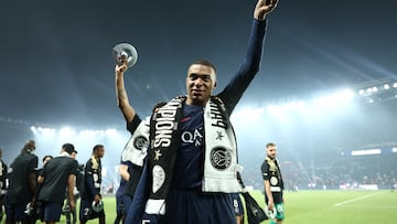 Paris Saint-Germain's French forward Kylian Mbappe celebrates during a ceremony following the French L1 football match between Paris Saint-Germain (PSG) and Toulouse (TFC) on May 12, 2024 at the Parc des Princes stadium in Paris. FRANCK FIFE/Pool via REUTERS