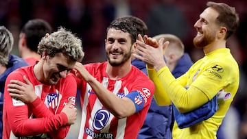 Griezmann, Koke y Oblak celebran un triunfo del Atlético en el Metropolitano.