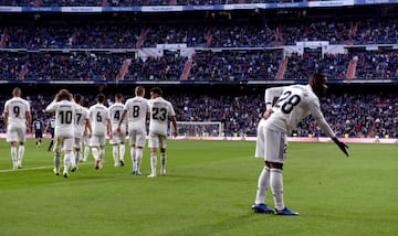 Vinicius Junior celebrates after his shot took a deflection off Kike to put Madrid ahead against Valladolid. Min.82