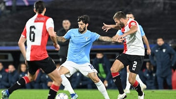 Lazio's Spanish midfielder #10 Luis Alberto fights for the ball with Feyenoord's Dutch defender #02 Bart Nieuwkoop during the UEFA Champions League Group E football match between Feyenoord and Lazio at The De Kuip Stadium, in Rotterdam on October 25, 2023. (Photo by JOHN THYS / AFP)