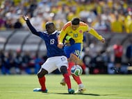 LANDOVER, MARYLAND - MARCH 29: James Rodriguez of Colombia and N'Golo Kane of France compete for the ball during the international friendly match between Colombia and France at Northwest Stadium on March 29, 2026 in Landover, Maryland. Hannah Foslien/Getty Images/AFP (Photo by Hannah Foslien / GETTY IMAGES NORTH AMERICA / Getty Images via AFP)