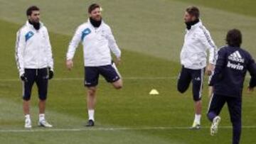 Entrenamiento del Real Madrid. Arbeloa, Xabi Alonso y Sergio Ramos.