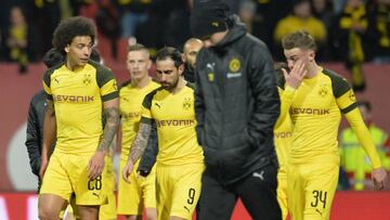 (L to R) Dortmund&#039;s Belgian midfielder Axel Witsel, Dortmund&#039;s Spanish forward Paco Alcacer and Dortmund&#039;s Danish forward Jacob Bruun Larsen leave the pitch after the German first division Bundesliga match between 1 FC Nuremberg and Borussi