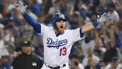 LOS ANGELES, CA - OCTOBER 26: Max Muncy #13 of the Los Angeles Dodgers celebrates his eighteenth inning walk-off home run to defeat the the Boston Red Sox 3-2 in Game Three of the 2018 World Series at Dodger Stadium on October 26, 2018 in Los Angeles, Cal