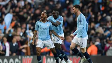 MANCHESTER, ENGLAND - APRIL 17:  Raheem Sterling of Manchester City celebrates with teammates Benjamin Mendy and Aymeric Laporte after scoring his team&#039;s first goal during the UEFA Champions League Quarter Final second leg match between Manchester Ci