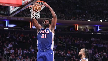 Philadelphia 76ers center Joel Embiid (21) dunks in the fourth quarter against the New York Knicks at Madison Square Garden.