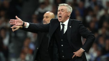 Real Madrid's Italian coach Carlo Ancelotti shouts instructions to his players from the touchline during the UEFA Champions League quarter final first leg football match between Real Madrid CF and Manchester City at the Santiago Bernabeu stadium in Madrid on April 9, 2024. (Photo by Pierre-Philippe MARCOU / AFP)
