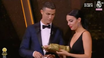 Cristiano picks up Ballon d'Or - and a gift for him and Georgina...