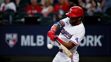 Jun 3, 2023; Arlington, Texas, USA; Texas Rangers center fielder Leody Taveras (3) bats against the Seattle Mariners during the second inning at Globe Life Field. Mandatory Credit: Jerome Miron-USA TODAY Sports