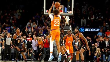 Mar 4, 2022; Phoenix, Arizona, USA; Phoenix Suns forward Cameron Johnson (23) shoots the game winning shot in the closing seconds of the game against the New York Knicks at Footprint Center. Mandatory Credit: Mark J. Rebilas-USA TODAY Sports