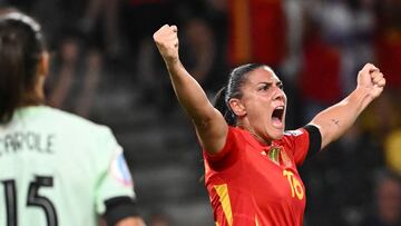 Spain's forward #16 Cristina Martin-Prieto (R) celebrates after she scored her team's fifth goal during the UEFA Women's Euro 2025 Group B football match between Spain and Portugal at the Wankdorf stadium in Bern, on July 3, 2025. (Photo by SEBASTIEN BOZON / AFP)