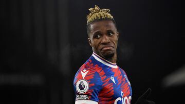 Soccer Football - Premier League - Crystal Palace v Manchester City - Selhurst Park, London, Britain - March 11, 2023 Crystal Palace's Wilfried Zaha reacts REUTERS/Tony Obrien EDITORIAL USE ONLY. No use with unauthorized audio, video, data, fixture lists, club/league logos or 'live' services. Online in-match use limited to 75 images, no video emulation. No use in betting, games or single club /league/player publications. Please contact your account representative for further details.