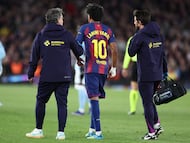Barcelona's Spanish forward #10 Lamine Yamal leaves the pitch after sustaining an injury during the Spanish league football match between FC Barcelona and RC Celta de Vigo at Camp Nou stadium in Barcelona on April 22 , 2026. (Photo by Josep LAGO / AFP)