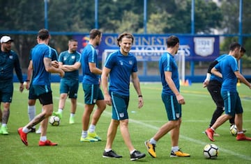 In this picture taken on March 1, 2018, Uruguayan player Diego Forlan (C) attends a team training session with Hong Kong Premier League football club Kitchee in Hong Kong.