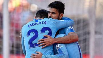 Costa, Morata y Griezmann se abrazan en Vallecas.