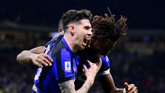 Soccer Football - Serie A - Inter Milan v Lecce - San Siro, Milan, Italy - December 23, 2023 Inter Milan's Yann Aurel Bisseck celebrates scoring their first goal with Inter Milan's Alessandro Bastoni REUTERS/Daniele Mascolo