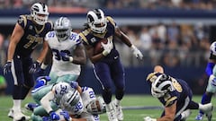 ARLINGTON, TX - OCTOBER 01: Todd Gurley #30 of the Los Angeles Rams runs the ball past Jeff Heath #38 and Brian Price #92 of the Dallas Cowboys in the third quarter at AT&amp;T Stadium on October 1, 2017 in Arlington, Texas.   Ronald Martinez/Getty Images/AFP
 == FOR NEWSPAPERS, INTERNET, TELCOS &amp; TELEVISION USE ONLY ==