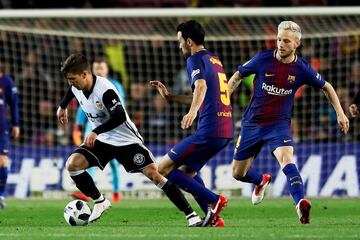 Vietto, Busquets y Rakitic.