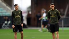 (FILES) In this file photo taken on May 28, 2019 Arsenal&#039;s German midfielder Mesut Ozil (L) and Arsenal&#039;s German-born Bosnian defender Sead Kolasinac (R) attend a training session at the Baku Olympic Stadium in Baku on May 28, 2019 on the eve of