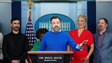 Jason Sudeikis takes to the podium as fellow Ted Lasso cast members, including Brett Goldstein, Hannah Waddingham and Brendan Hunt,  join Press Secretary Karine Jean-Pierre (2ndL) at the daily press briefing to discuss the importance of addressing mental health to promote overall well-being, in the Brady Press Briefing Room at the White House in Washington, U.S., March 20, 2023. REUTERS/Kevin Lamarque