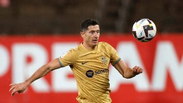 Barcelona's Polish forward Robert Lewandowski eyes the ball during the Spanish League football match between RCD Mallorca and FC Barcelona at the Visit Mallorca stadium in Palma de Mallorca on October 1, 2022. (Photo by JAIME REINA / AFP) (Photo by JAIME REINA/AFP via Getty Images)