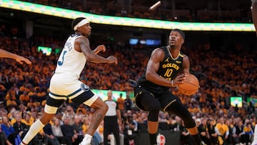 Jimmy Butler, defendido por Jaden McDaniels durante la eliminatoria contra los Timberwolves.