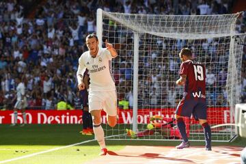 Bale celebrates after netting his 50th league goal for Real on Sunday.