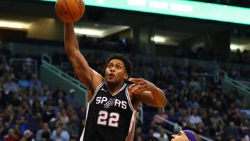 Dec 9, 2017; Phoenix, AZ, USA; San Antonio Spurs forward Rudy Gay (22) dunks the ball against Phoenix Suns forward Jared Dudley in the fourth quarter at Talking Stick Resort Arena. Mandatory Credit: Mark J. Rebilas-USA TODAY Sports