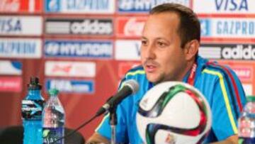 Colombia's head coach Fabian Taborda speaks during the team's press conference at the FIFA Women's World Cup in Edmonton, Canada on June 21, 2015. Colombia is set to take on the United States in their group of 16 match Monday. AFP PHOTO/GEOFF ROBINS