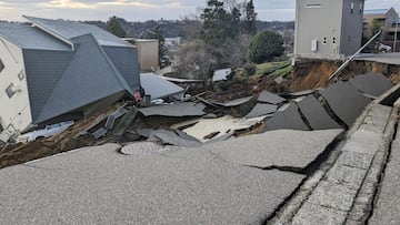 A view of a collapsed road and houses because of an earthquake in Wajima, Ishikawa prefecture, Japan January 1, 2024, in this photo released by Kyodo. Mandatory credit Kyodo/via REUTERS ATTENTION EDITORS - THIS IMAGE WAS PROVIDED BY A THIRD PARTY. MANDATORY CREDIT. JAPAN OUT. NO COMMERCIAL OR EDITORIAL SALES IN JAPAN   REFILE - CORRECTING DATE       TPX IMAGES OF THE DAY