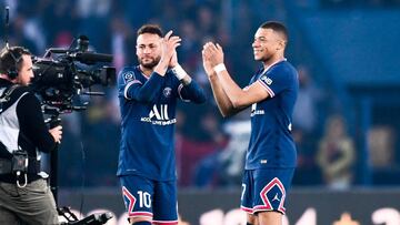 Kylian Mbappé and Neymar applaud PSG fans after Mauricio Pochettino's side wrapped up the title against Lens at Parc des Princes.