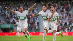 ELCHE, SPAIN - AUGUST 22: Alex Collado of Elche celebrates with teammates after scoring their side's first goal during the LaLiga Santander match between Elche CF and UD Almeria at Estadio Manuel Martinez Valero on August 22, 2022 in Elche, Spain. (Photo by Aitor Alcalde/Getty Images)