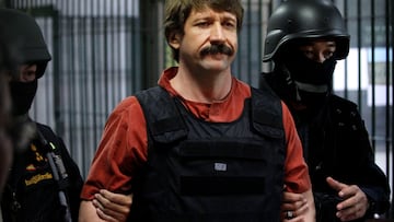 FILE PHOTO: Suspected Russian arms dealer Viktor Bout is escorted by members of a special police unit after a hearing at a criminal court in Bangkok October 5, 2010. REUTERS/Sukree Sukplang/File Photo