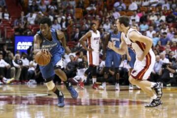 Andrew Wiggins y Goran Dragic.