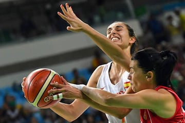 Serbia's guard Dajana Butulija (right) defends against Spain's forward Alba Torrens during Thursday's semi-final.