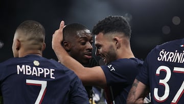 Paris Saint-Germain's Portuguese forward #09 Goncalo Ramos (CR) congratulates Paris Saint-Germain's French forward #10 Ousmane Dembele (C) after he scored PSG's third goal during the French L1 football match between Paris Saint-Germain (PSG) and AS Monaco at The Parc des Princes Stadium in Paris on November 24, 2023. (Photo by FRANCK FIFE / AFP)