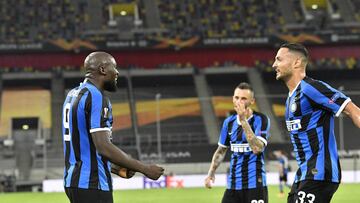 Inter Milan's Romelu Lukaku, left, celebrates with his teammates after scoring his side's second goal during the Europa League quarter finals soccer match between Inter Milan and Bayer Leverkusen at Duesseldorf Arena, in Duesseldorf, Germany, Mo