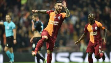 Galatasaray's Turkish midfielder Adem Buyuk (C) celebrates after scoring a goal during the UEFA Champions League football match between Galatasaray and Bruges (Club Brugge), on November 26, 2019 Ali-Sami-Yen stadium in Istanbul. (Photo by OZAN KOSE /
