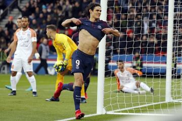 Paris Saint Germain Edinson Cavani celebrates after scoring during the French League 1 game against Montpellier HSC.
