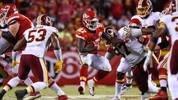 KANSAS CITY, MO - OCTOBER 2: Running back Kareem Hunt #27 of the Kansas City Chiefs makes a jump cut to try and avoid the tackle attempt of inside linebacker Zach Brown #53 of the Washington Redskins during the third quarter at Arrowhead Stadium on October 2, 2017 in Kansas City, Missouri. ( Photo by Jason Hanna/Getty Images )
 == FOR NEWSPAPERS, INTERNET, TELCOS &amp; TELEVISION USE ONLY ==