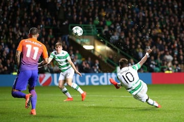 Celtic's Moussa Dembele hooks in his side's third of the night.