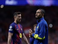 MADRID, 14/04/2026.- El delantero brasileño del FC Barcelona Raphinha al finalizar el partido de vuelta de cuartos de final de Liga de Campeones que Atlético de Madrid y FC Barcelona disputaron este martes en el estadio Metropolitano, en Madrid. EFE/Juanjo Martín
