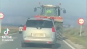 This tractor driver was having none of it when the car behind tried to overtake, leading to a side-splitting game of cat and mouse.